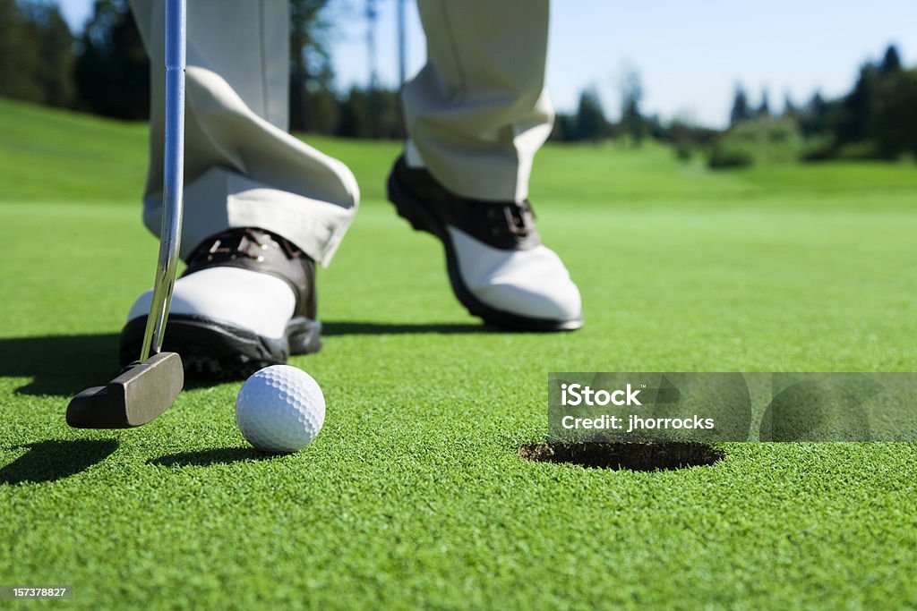 Golfer Tapping In  Golf Stock Photo