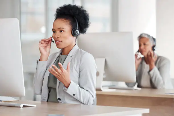 Callcenter consultant, black woman and CRM, phone call and talking, communication and contact us. Talking, telecom and female, customer support or telemarketing with agent and help desk employee