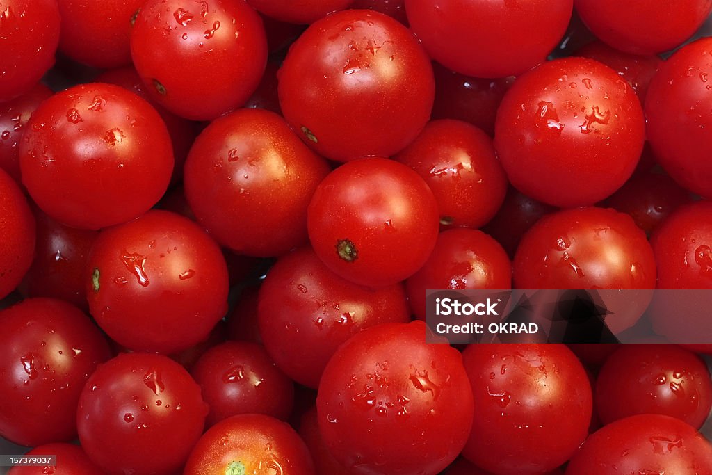 Fresco rosso pomodoro ciliegino sfondo di carta da parati - Foto stock royalty-free di Pomodoro