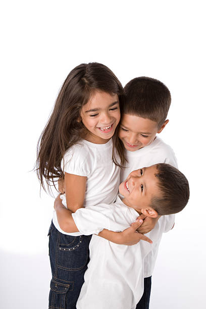Hispanic siblings embrace. Ages of children are between 2 and 5. \n\n[url=http://www.istockphoto.com/my_lightbox_contents.php?lightboxID=4711032][img]http://www.janibrysonstudios.com/Banners/Hernandez[/img][/url]\n\n[url=http://www.istockphoto.com/my_lightbox_contents.php?lightboxID=4167156][img]http://www.janibrysonstudios.com/Banners/5to7[/img][/url]\n\n[url=http://www.istockphoto.com/my_lightbox_contents.php?lightboxID=4167144][img]http://www.janibrysonstudios.com/Banners/2to4[/img][/url]\n\n[url=http://www.istockphoto.com/my_lightbox_contents.php?lightboxID=3373887][img]http://www.janibrysonstudios.com/Banners/FacesOfDiversity[/img][/url]\n\n[url=http://www.istockphoto.com/my_lightbox_contents.php?lightboxID=3420243][img]http://www.janibrysonstudios.com/Banners/SimplyFaces[/img][/url]\n\n[url=http://www.istockphoto.com/my_lightbox_contents.php?lightboxID=2620486][img]http://www.janibrysonstudios.com/Banners/Children[/img][/url]\n\n[url=http://www.istockphoto.com/my_lightbox_contents.php?lightboxID=2442636][img]http://www.janibrysonstudios.com/Banners/School[/img][/url]\n\n[url=http://www.istockphoto.com/my_lightbox_contents.php?lightboxID=3602975][img]http://www.janibrysonstudios.com/Banners/KidsFont[/img][/url]\n\n[url=http://www.istockphoto.com/my_lightbox_contents.php?lightboxID=3613393][img]http://www.janibrysonstudios.com/Banners/KidWords[/img][/url]