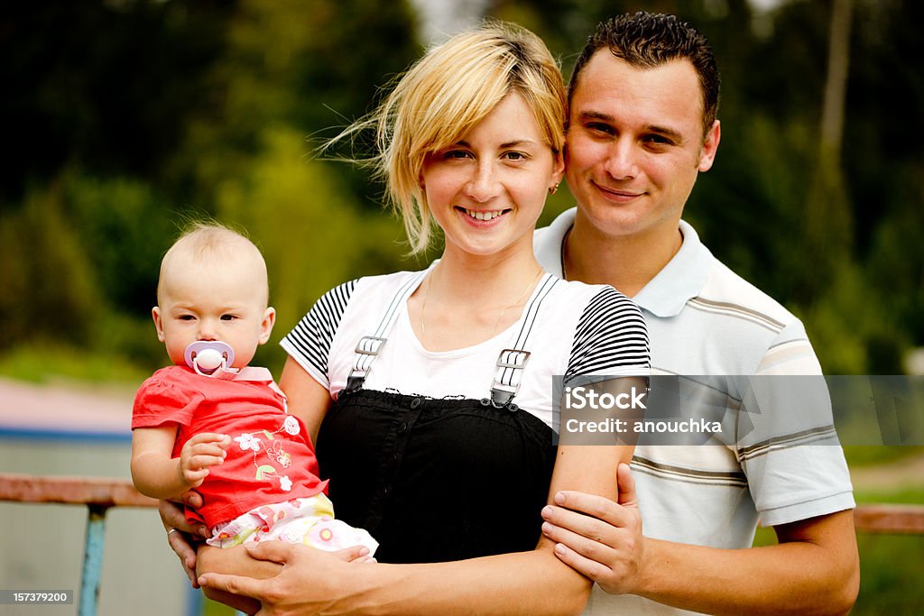 Glückliche junge Familie - Lizenzfrei 6-11 Monate Stock-Foto