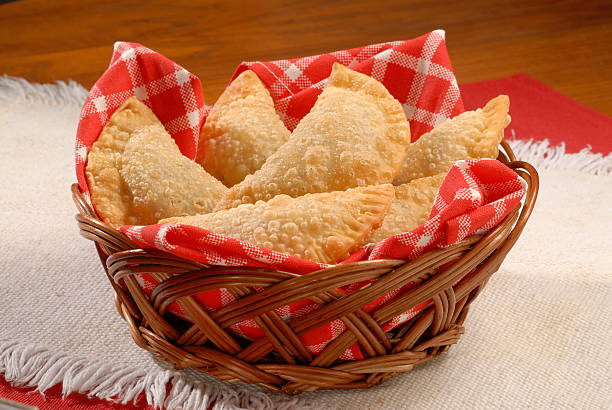 Empanadas in a basket  fritter photos stock pictures, royalty-free photos & images