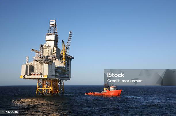 Platform And Boat Stock Photo - Download Image Now - Offshore Platform, North Sea, Container Ship
