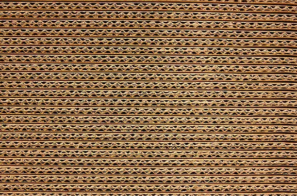 Photo of Background of Corrugated Brown Cardboard