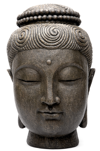 Studio shot of generic Buddha's head on white background. Front view. Taken with Canon 1 DS Mark III