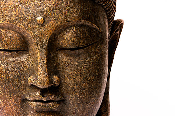 vorderansicht des buddha gesicht - buddha stock-fotos und bilder