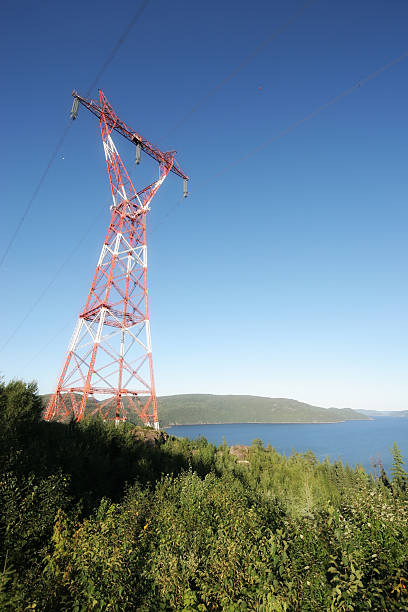 Electric Pylons over the Saguenay River  buzbuzzer energy cable steel cable stock pictures, royalty-free photos & images