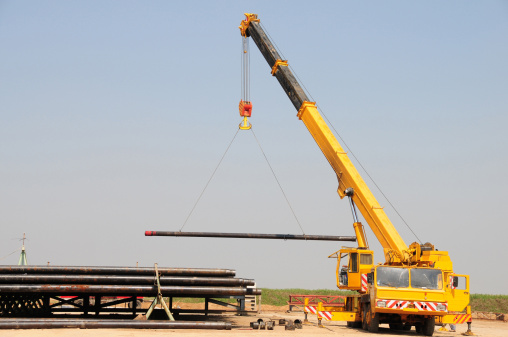 A lifting crane which is used to carry heavy loads in the oil and gas industry.