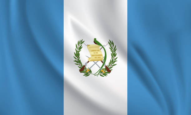 istock Waving flag of Guatemala blowing in the wind. Full page flying flag 1573804395