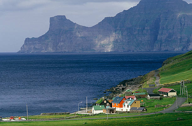istock Little village at the coastline, steep coast 157380658
