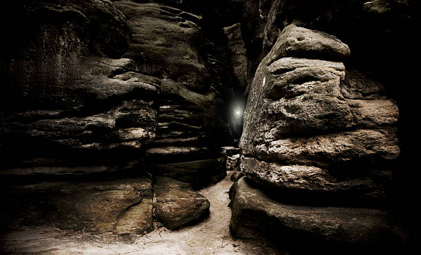 istock mysterious places - path through big rocks to another universe 157380749