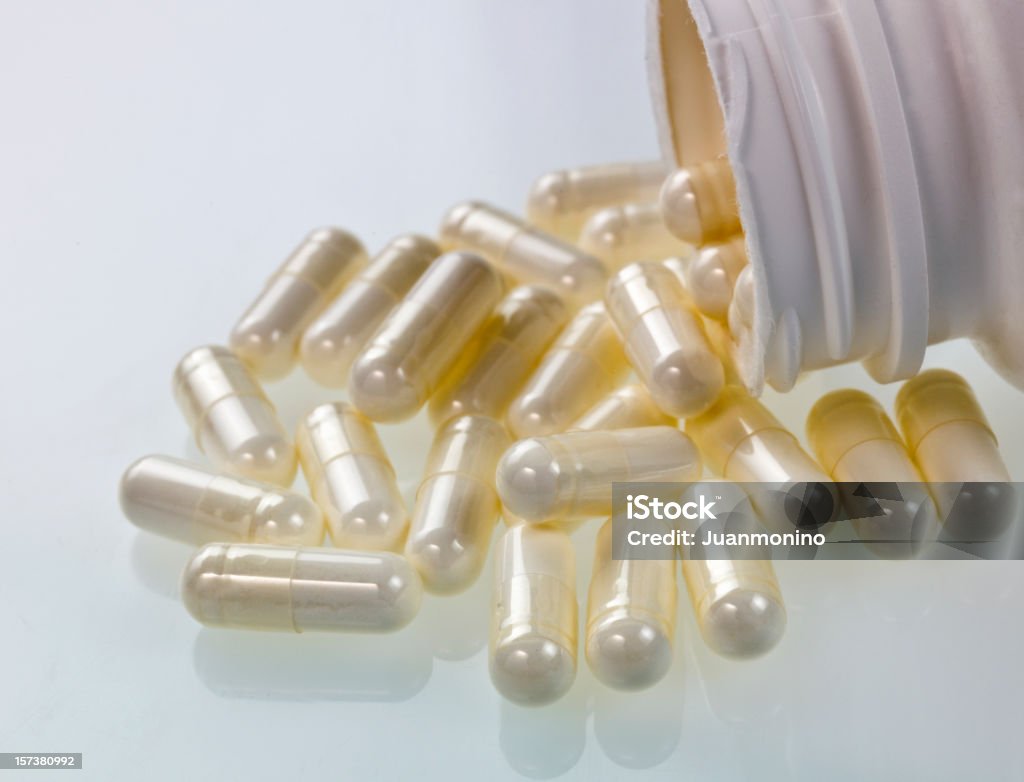 Capsule bianche - Foto stock royalty-free di Melatonina