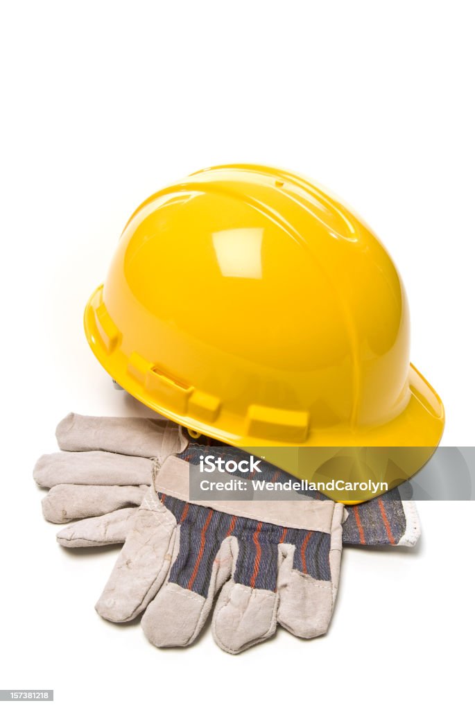 Hard Hat and Work Gloves Isolated on white with plenty of copy space. Clothing Stock Photo