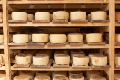Limerick, Ireland - June 4, 2022: Variety of cheeses at the Milk Market, a traditional farmers market in Limerick, Ireland