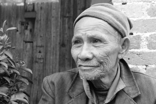 Black and white portrait of an old Chinese, from a small village in Guangdong province.
