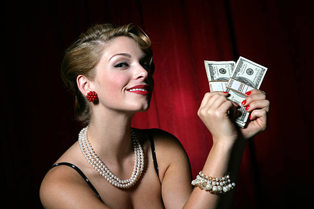 Money Girl Retro woman with cash fine art portrait pin up girl glamour beauty stock pictures, royalty-free photos & images