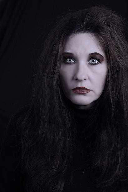 istock Spooky Woman (Or Ghost) Looks Mesmerized 157382196