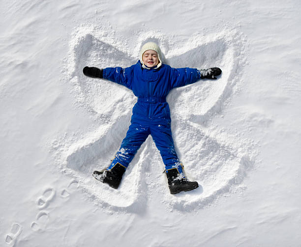snow Angel  snow angels stock pictures, royalty-free photos & images