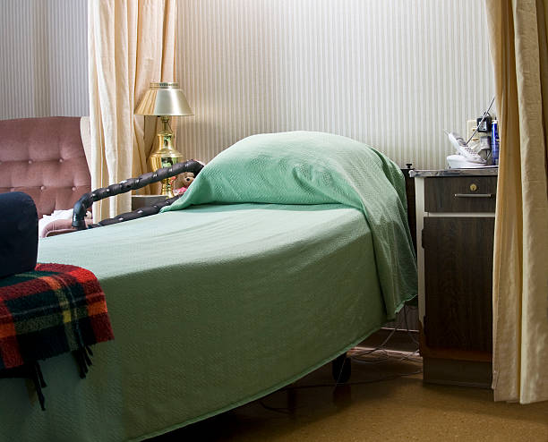 Empty Bed in Nursing Home stock photo