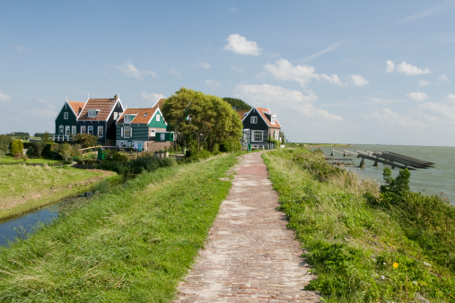 Colored cabins and beach of  Gouville-sur-Mer village in Cotentin coast