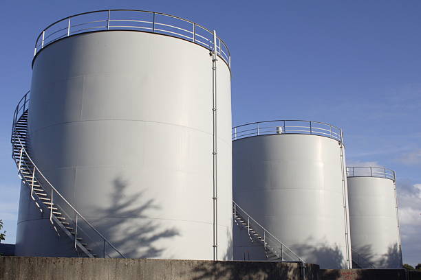 White oil tanks for storing fuel appear to be blank canvases White Fuel tanks fuel storage tank photos stock pictures, royalty-free photos & images