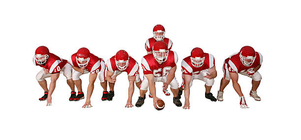 Football Players with Clipping Path Offensive line ready to run a play. offense sporting position photos stock pictures, royalty-free photos & images