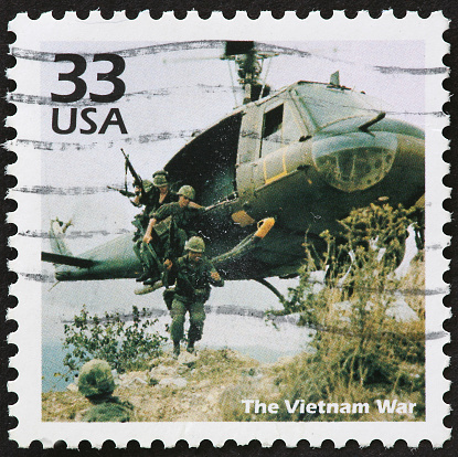 US soldiers and helicopter in the Vietnam War.