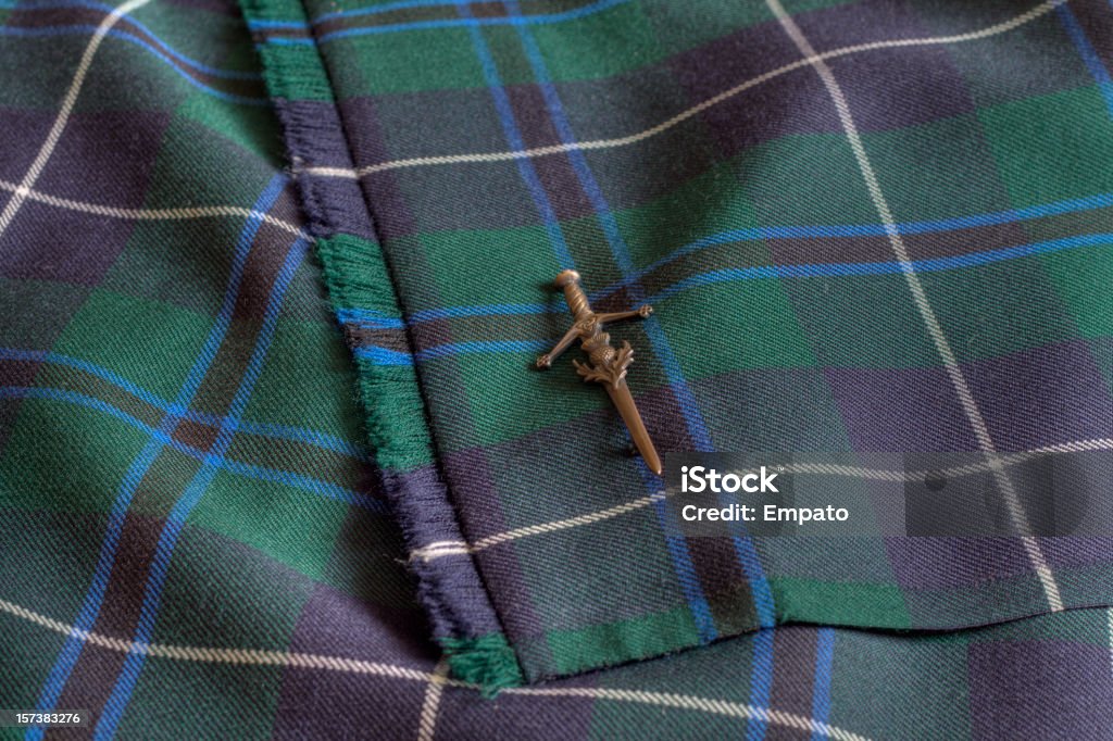 Gros plan sur un Kilt en Tartan et kiltpin. - Photo de Tartan libre de droits