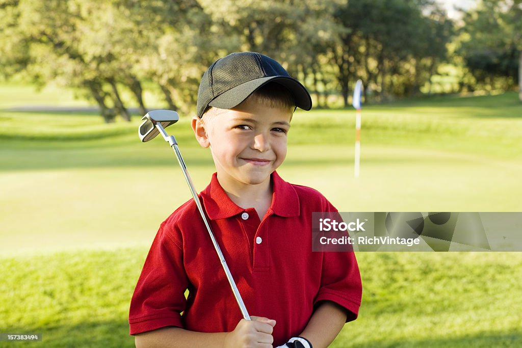 Pequeno jogador de golfe - Foto de stock de Golfe royalty-free