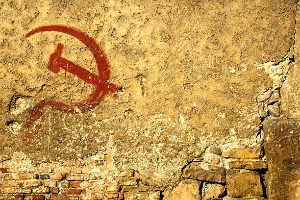 Communism symbol graffiti ruined stock photo
