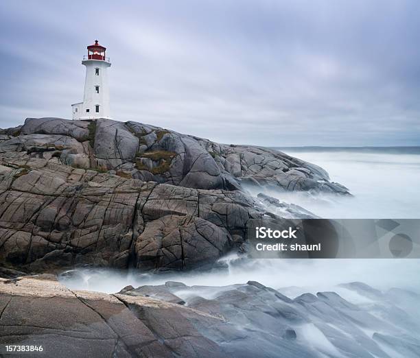 Dawn Storm Stock Photo - Download Image Now - Breaking Wave, Lighthouse, Atlantic Ocean