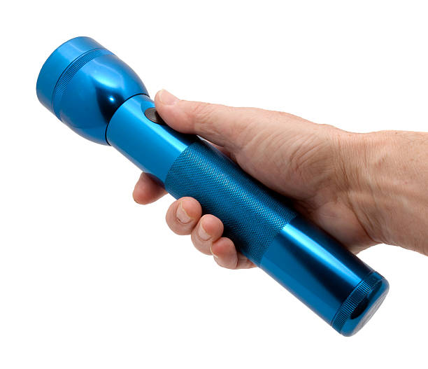 Hand with Blue Flashlight  electric torch stock pictures, royalty-free photos & images