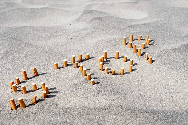 stop palenie - sand text alphabet beach zdjęcia i obrazy z banku zdjęć