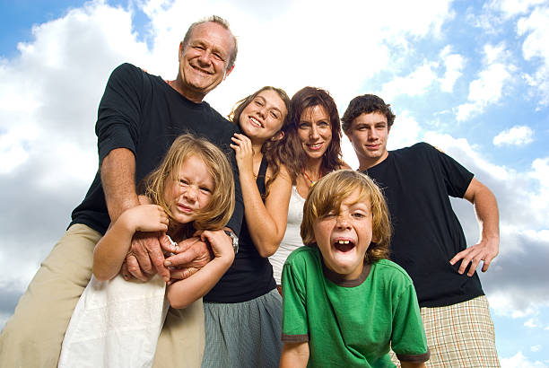 cool famiglia - preschooler portrait family outdoors foto e immagini stock