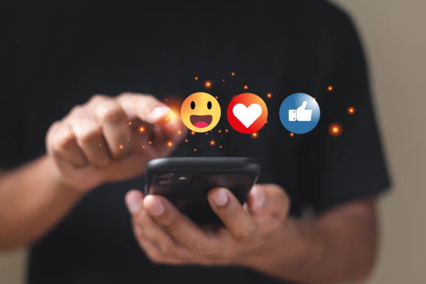 istock Online digital communication connection information with mobile phone. man using smartphone with social media icons. social media online concept. 1573848036