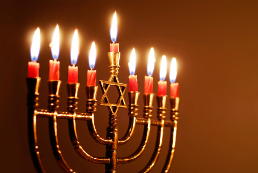 Hanukkah concept with bright light in the background