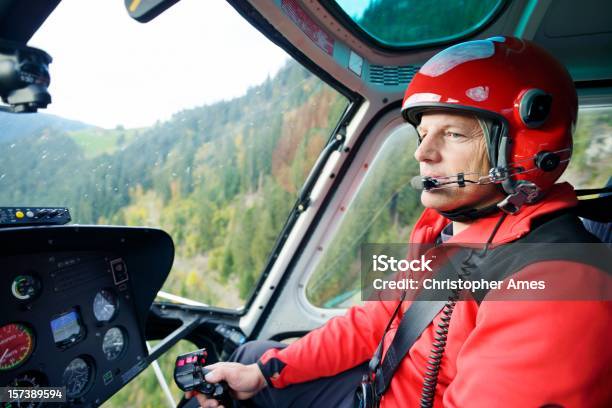 Male Pilot Flying Helicopter Stock Photo - Download Image Now - Helicopter Pilot, Helicopter, Piloting