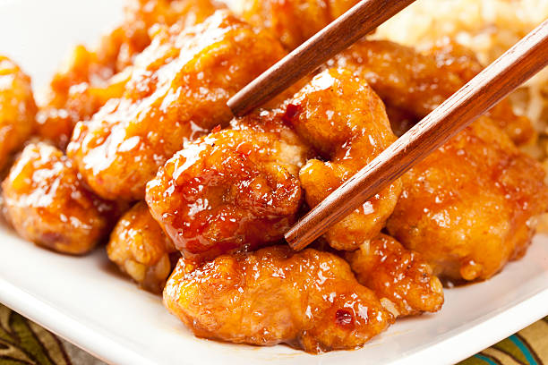 自家製オレンジの鶏飯を - chicken general tso food ストックフォトと画像