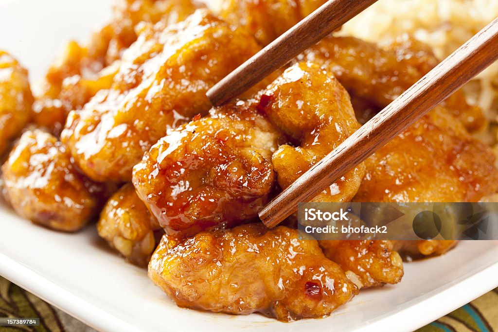 Homemade Orange Chicken with Rice Homemade Orange Chicken with Rice on a background Zuo Zongtang Stock Photo