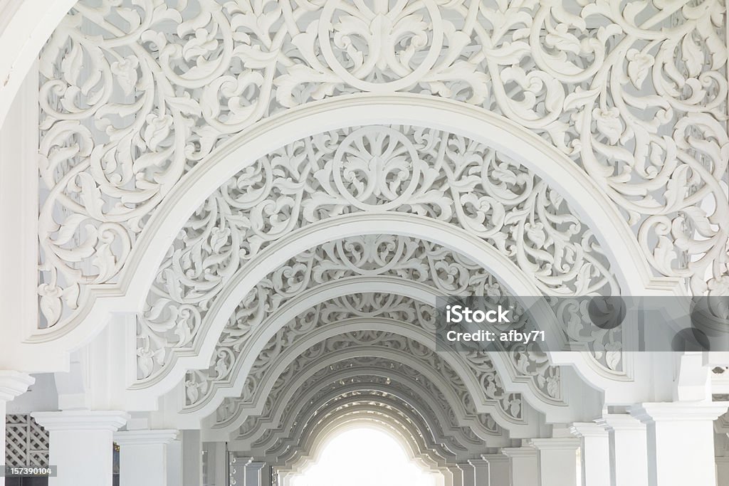 Highkey image of a beautiful intricate pattern Highkey image of a beautiful intricate pattern in a mosque Arch - Architectural Feature Stock Photo