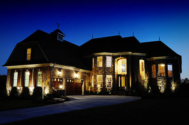 istock Large house with all the lights on at night 157393244