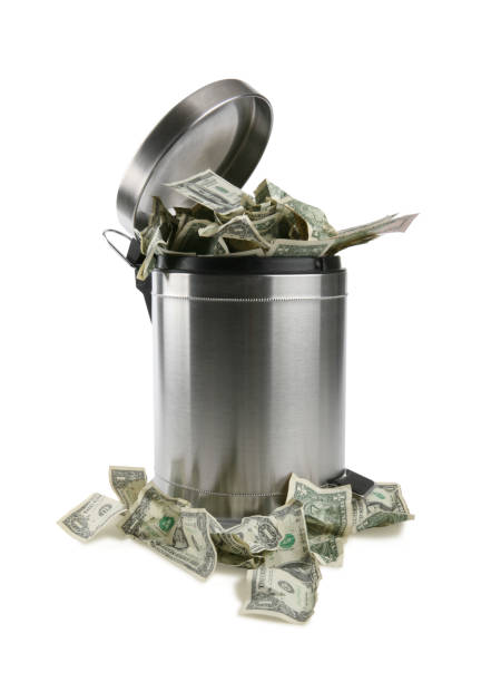 istock Throwing Money Away with Clipping Path 157393468