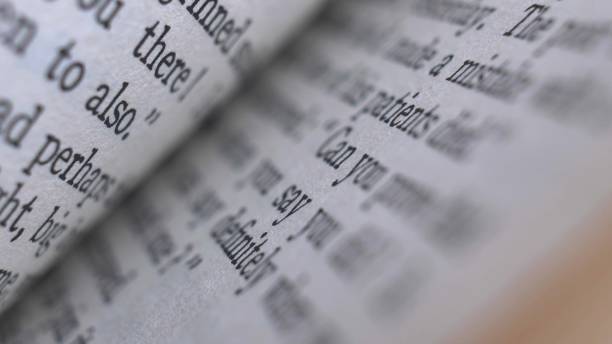istock Flicking Through Old Book Pages Close-up 1573939537