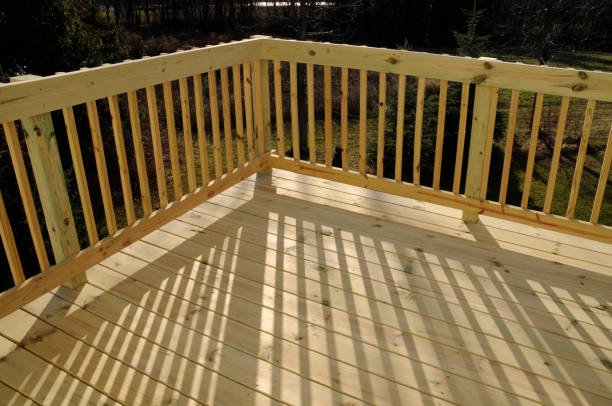 istock New Pine Wood Stock Lumber Patio Deck Building, Railing, Shadow 157394316