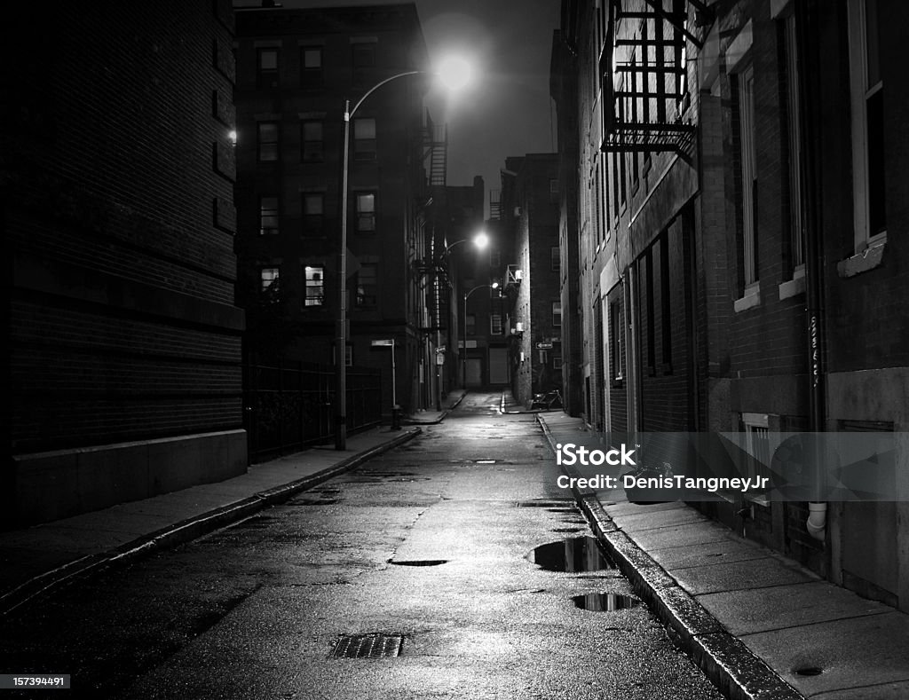 City Street in Black and White Dark street in the North End section of Boston, Massachusetts Dark Stock Photo