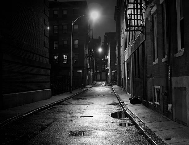 City Street in Black and White Dark street in the North End section of Boston, Massachusetts alley photos stock pictures, royalty-free photos & images