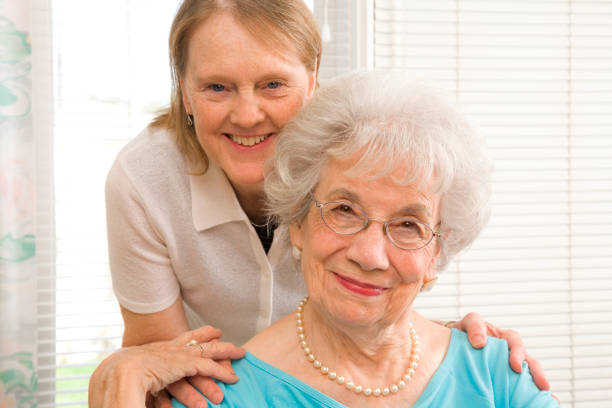 istock two mature women: mother and daughter-in-law 157394645