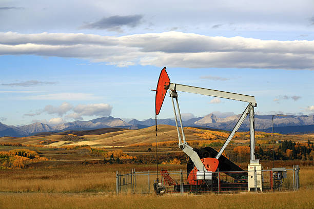 istock Red Pumpjack in the Alberta Foothills 157394723