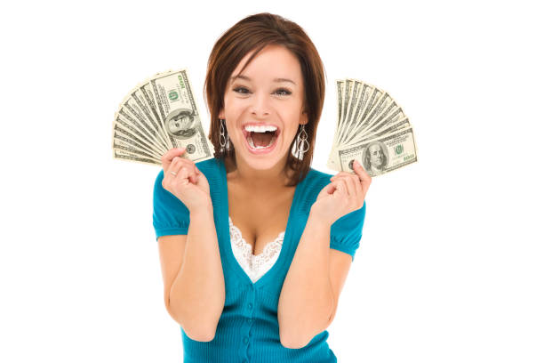 istock Happy Young Woman Holding Money 157394798