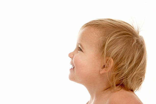 Head  And Shoulder Of Smiling Toddler stock photo